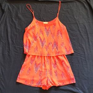Coral Romper with Colorful Chevron Pattern